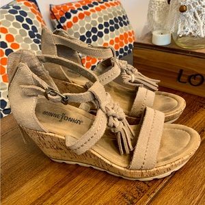 Minnetonka size 7 wedge heels with the fringe! Super cute for summer!